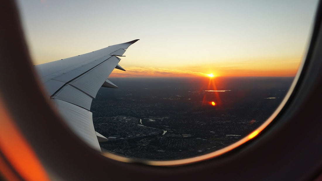 luxury plane travel shot with sunset background, Photo by Eva Darron on Unsplash