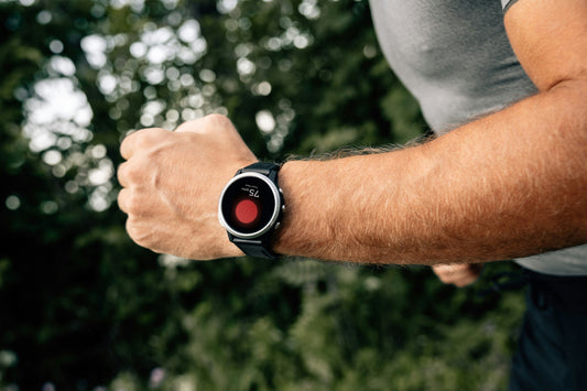 Man running with smartwatch
